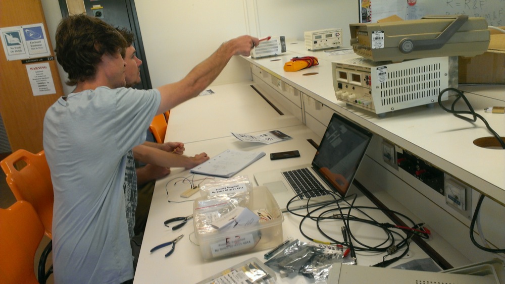 Brendan and Jayden troubleshoot the h-bridge design.